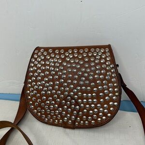Vintage Wester flare studded leather saddle bag
